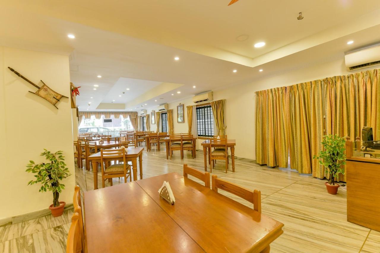 Capital O 15854 Grand Seasons Hotell Kochi Eksteriør bilde